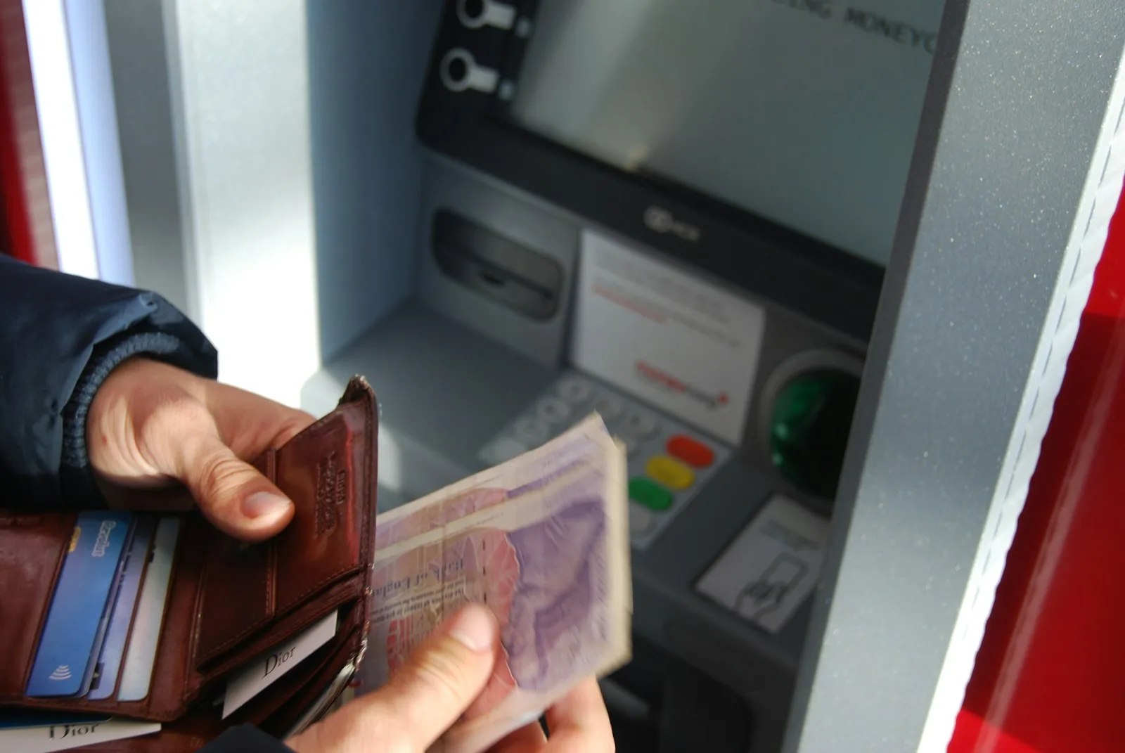 Wallet with Colombian pesos just taken out of the ATM